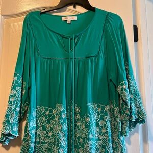 Flowy floral embroidered blouse with tassel tie